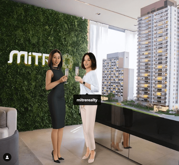Personagem virtual Satiko brindando com a embaixadora digital Ju Mitre pela parceria com a incorporadora e construtora Mitre Realty.
